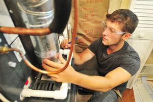 MCC HVAC student working on a furnace